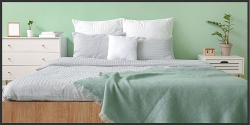 mint green bedroom with spa inspired colours and interior furnishings.